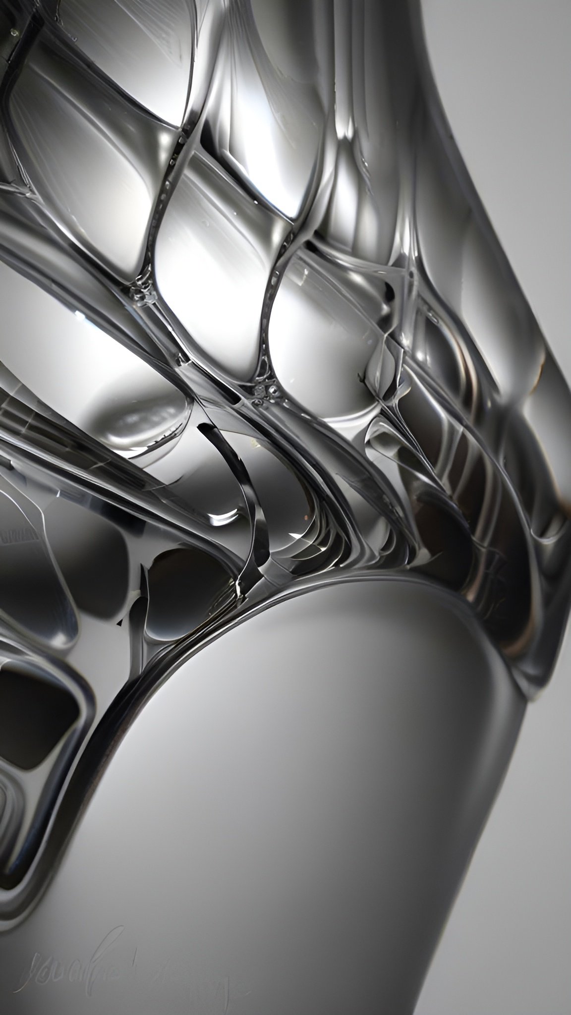 Abstract art close up of shiny silver metallic sculpture with organic fluid forms