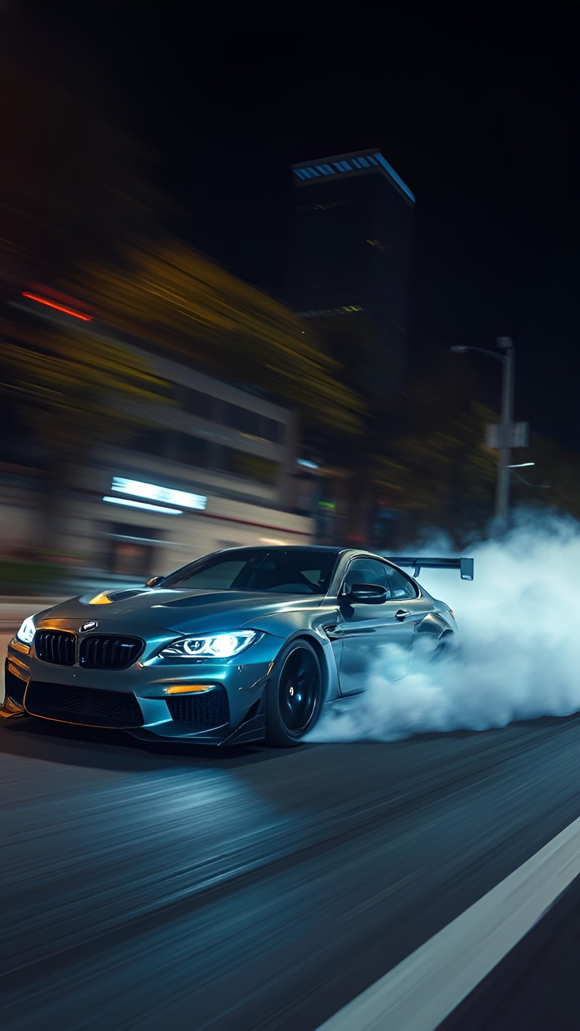 Modified BMW M car drifting at night with thick tire smoke and glowing headlights on urban road